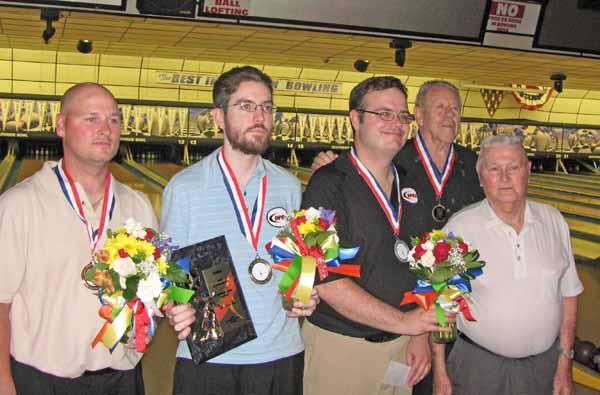 Left to right: Stephane Lepansee, John Zikis (champion), Mike Herbert, Frank Turner (proprietor), and James Wolfensberger (presiding over awards ceremony)